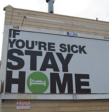 Image of exterior billboard with headline "If You're Sick, Stay at Home".