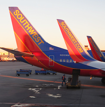 Image of Southwest Airlines planes at airport.