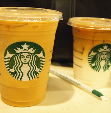 Close-up image of Starbucks drinks.