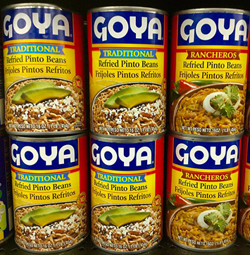 Image of Goya canned product on shelves.