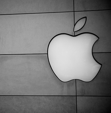 Image of Apple logo on the side of Apple store in Chicago.