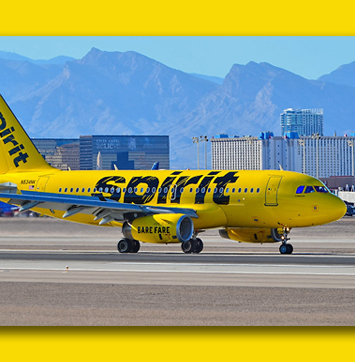 Image of Spirit Airlines plane on runway.