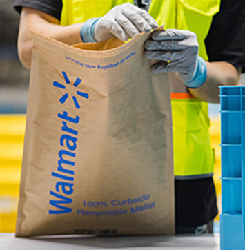 Image of employee and Walmart packaging.