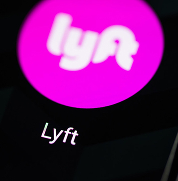 Image of Lyft logo on black background.
